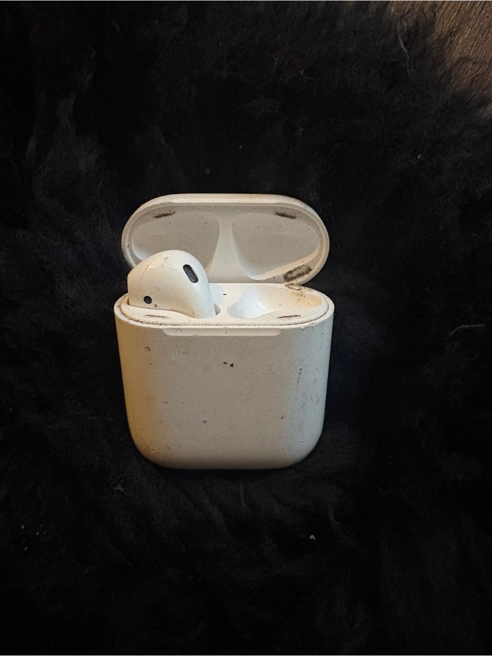 Wireless Earbud Charging Case with Single White Earbud left AirPod and case only